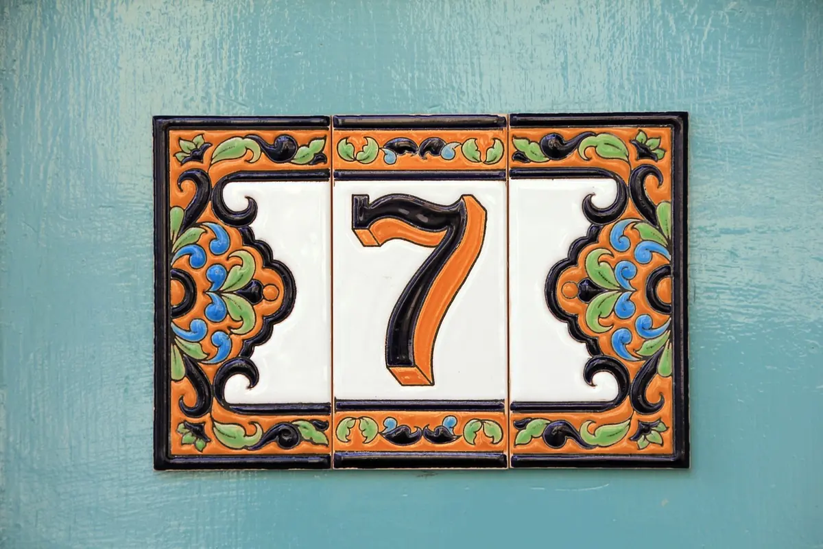 A decorative number tile on a wall